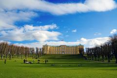 Scenic view of Frederiksberg Have park with trees, pathways, and a water body