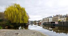 L'Erdre River and the pontoon of the harbor master's office on the Île de Versailles in Nantes