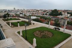 view of Lisbon city with prominent red rooftops and historic buildings