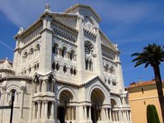 Monaco Cathedral with surrounding buildings and hilly landscape