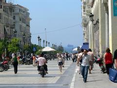 Aristoteles Street in Thessaloniki with people walking and buildings on both sides