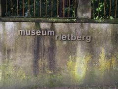 Stone wall at the entrance to Museum Rietberg