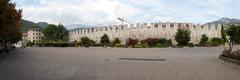 Trento Piazza Fiera panorama with Torrione and medieval walls