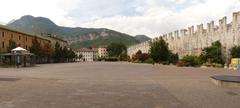 Panorama of Piazza Fiera in Trento, Italy with Torre Civica and medieval walls