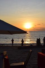 Panoramic view of Jimbaran beach with fishing boats and calm waters