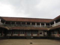 Madikeri Fort entrance with stone walls and an archway