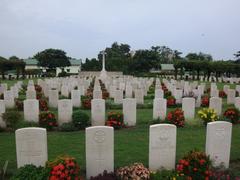 A cemetery with gravestones and trees