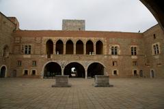 Courtyard of the Palace of the Kings of Majorca with two central wells