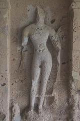 Mutilated depiction of Buddha in Cave 9, Kondivite Caves