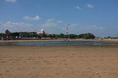 Chennai Marina Beach with people walking on the shoreline