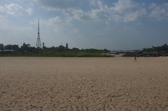 Chennai Marina Beach with people and buildings in view