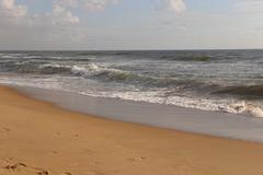 Chennai beach view with blue sky and sandy shore