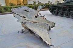 wreckage of the tail section of an Israeli Douglas A-4 Skyhawk aircraft in a museum