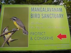 Signage indicating direction to Mangalavanam Bird Sanctuary in Kochi, Kerala