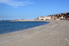 panoramic view of Banyuls-sur-Mer, France with houses, mountains, and Mediterranean Sea