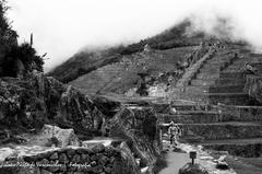 Tourists exploring Machu Picchu during rainy season