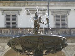 Singing fountain in Prague Royal Garden with Renaissance Royal Summer Palace in the background