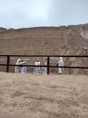 Representation of an offering ritual with a vessel at Huaca Pucllana