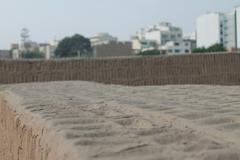 Close-up of the top of an adobe wall at Huaca Pucllana