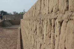 huaca pucllana wall details with lined adobes