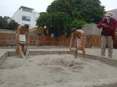 People of the Lima culture making adobe bricks at Huaca Pucllana