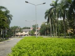 Mehan Garden in Ermita, Manila with the Universidad de Manila in the background