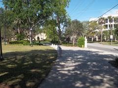 Memorial Park in Jacksonville featuring a bronze statue and a scenic riverfront view