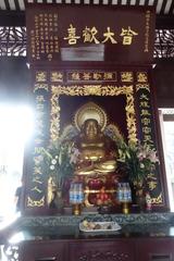 Maitreya statue at the Temple of the Six Banyan Trees