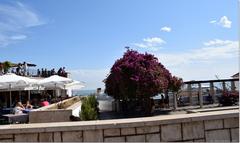 A panoramic view of Lisbon with historic buildings and the Tagus River