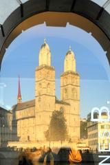 Grossmünster reflected in water Zurich Switzerland