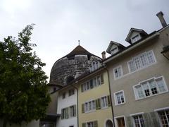 A picturesque view of Solothurn, Switzerland featuring the Aare River and historic buildings