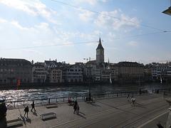 View of the Limmat river in Zurich with buildings along its banks