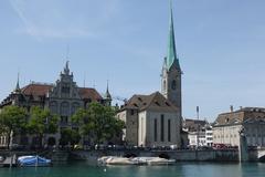 Church in Zürich with a clock tower and spire