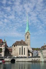 A scenic view of Zürich with historical buildings and the Limmat River