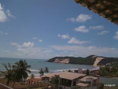 Panoramic view of Cidade Natal, RN with urban skyline and lush greenery