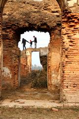 A person saving a child amid the ruins of Musabagh