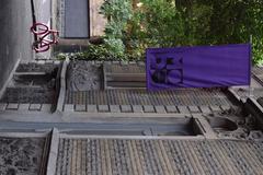 Flag hanged from the facade of the Museo del Objeto del Objeto in Mexico City