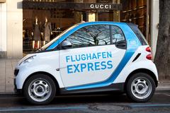 Smart car at Königsallee in Düsseldorf with Airport Express advertisement