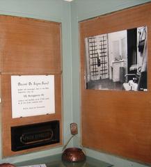 Inside Freud Museum exhibition room with artifacts and furniture