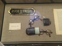 Sigmund Freud Museum original doorplate and glasses on display