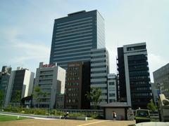 Panoramic view of Nakanoshima island with modern skyscrapers and park area