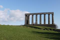 view of Edinburgh Scotland featuring historic buildings and greenery