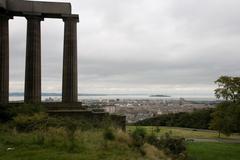 Edinburgh skyline with historic buildings and a cloudy sky