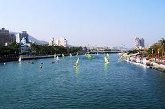 Love River at sunset with surrounding buildings in Kaohsiung, Taiwan