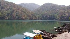 scenic beauty of Naukuchiatal lake and surrounding mountains in Uttarakhand