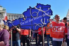 People demonstrating with signs against the 12-hour workday initiative