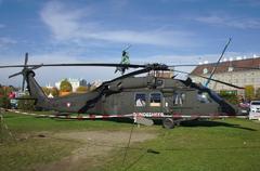 Austrian Federal Army helicopter flying over a field