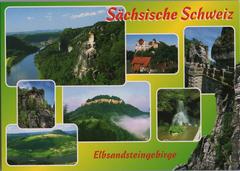 Scenic view of Sächsische Schweiz with multiple rock formations and greenery