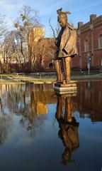 Statue of a soldier in front of the Arsenal