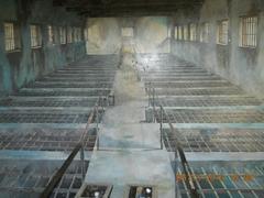 wall mural depicting political prison under the Republic of Vietnam regime